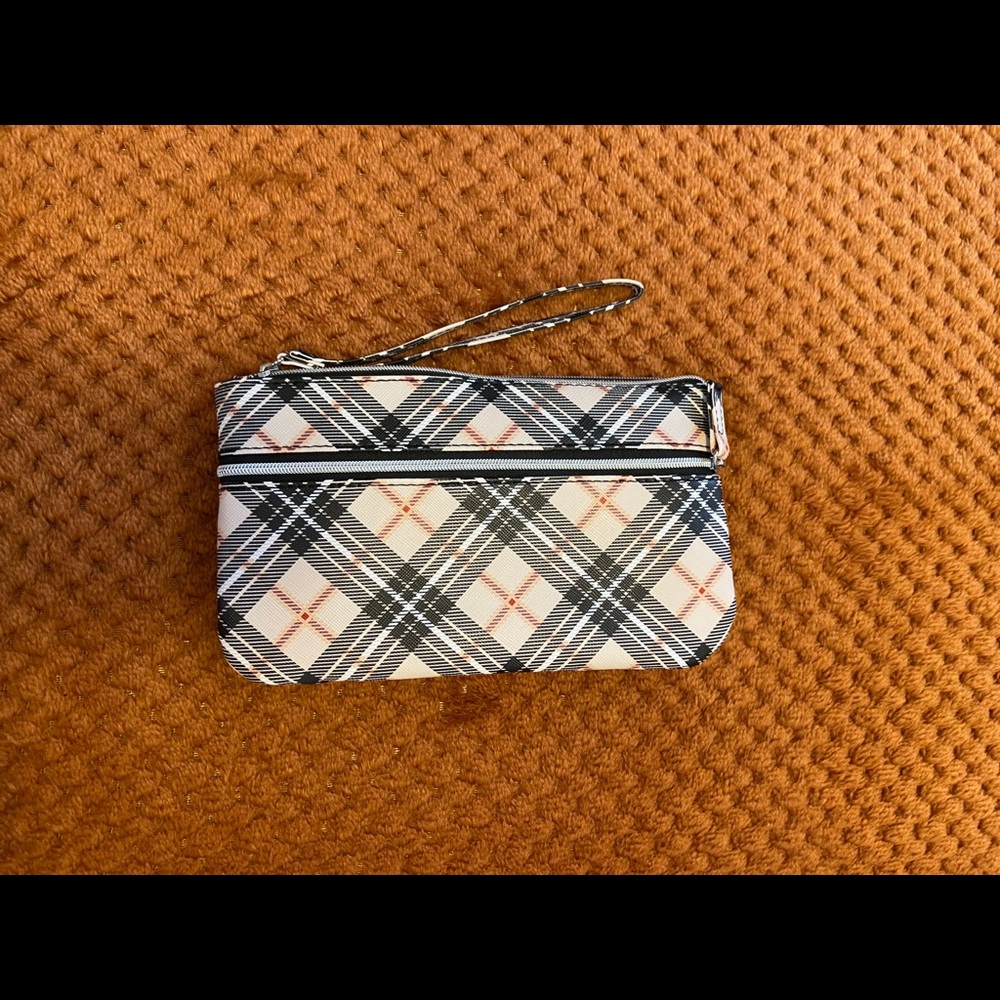 Wristlet with portable charger